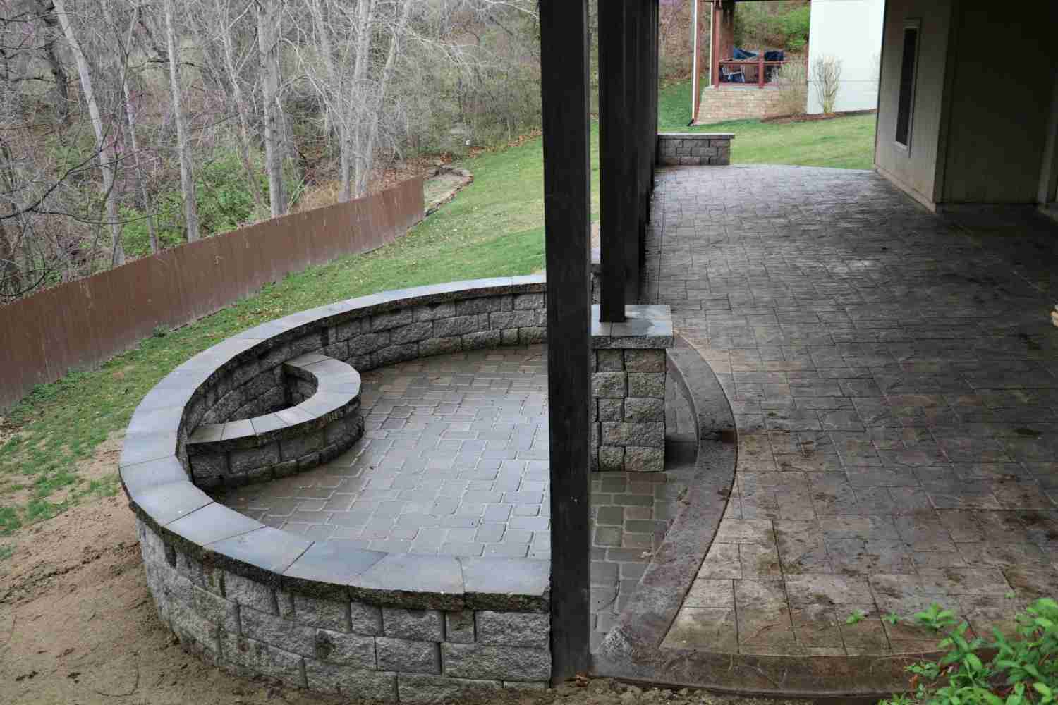 patio with a combination of stamped concrete and pavers