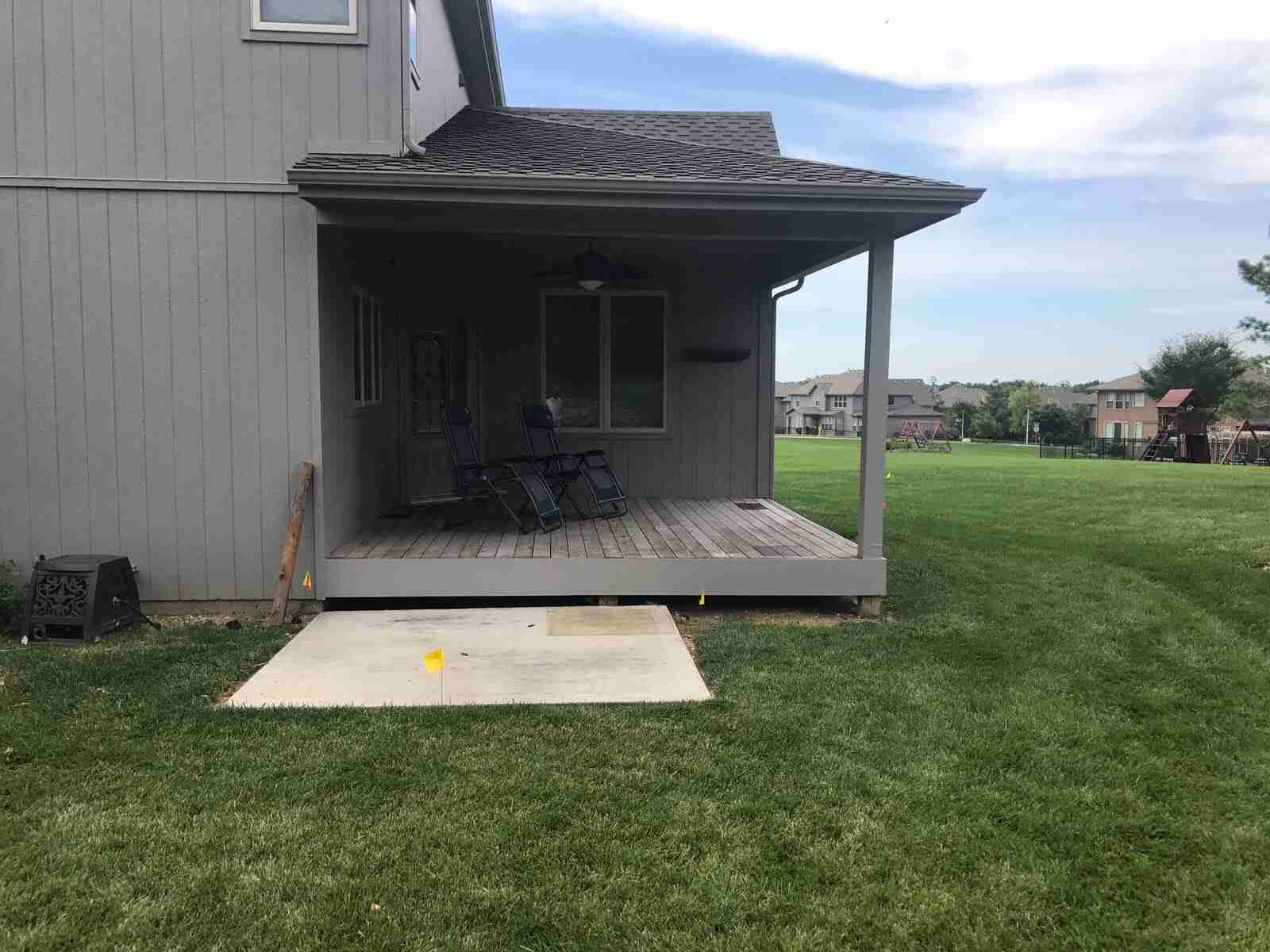small deck and a measly concrete slab