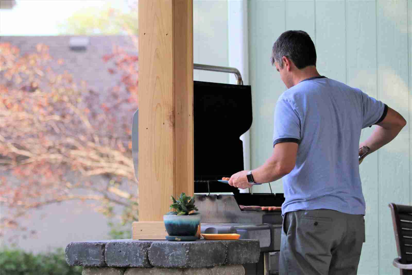 Mr. homeowner grilling