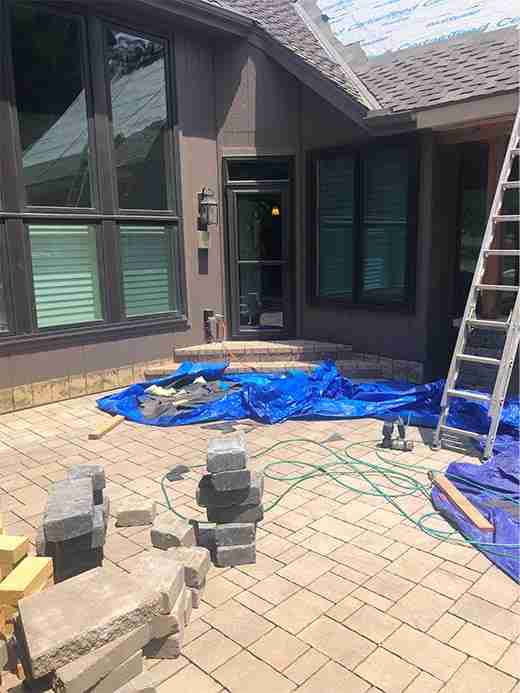 stone flooring spans patio outdoor living space