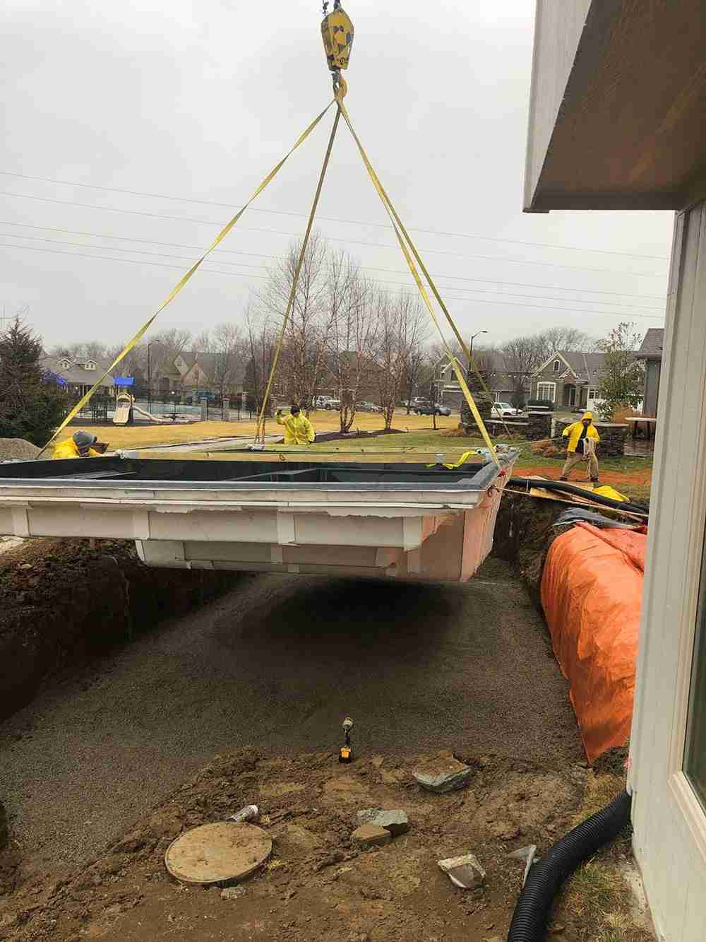 pool hoisted over the house