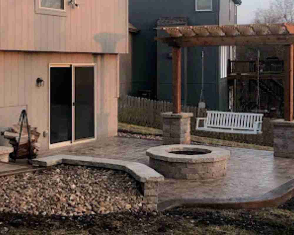 stone fire pit surrounded by outdoor seating